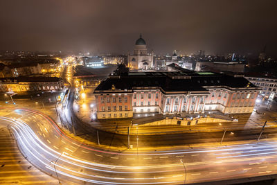 High angle view of illuminated city buildings at night