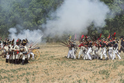 Panoramic shot of people in field