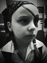 Close-up portrait of boy looking away