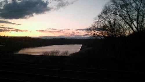 Scenic view of landscape at sunset