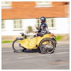 Man riding motorcycle on street