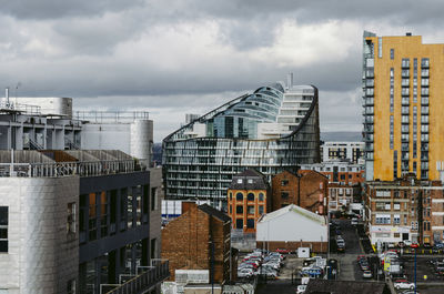 Buildings in city against sky