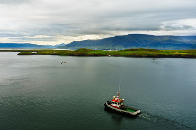 Scenic view of sea against sky near reykjavik harbor 