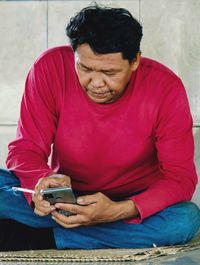 Young man using mobile phone