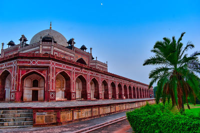 View of historical building against blue sky