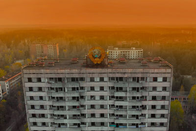 Soviet coat of arms on high-rise building in pripyat, view from above. pripyat aerial panorama city