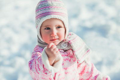 Portrait of cute girl in snow