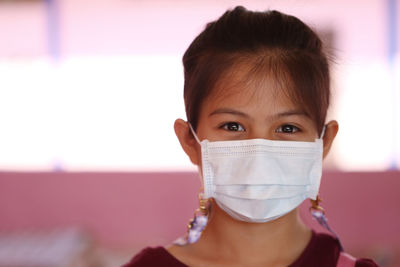 Close-up of woman wearing mask