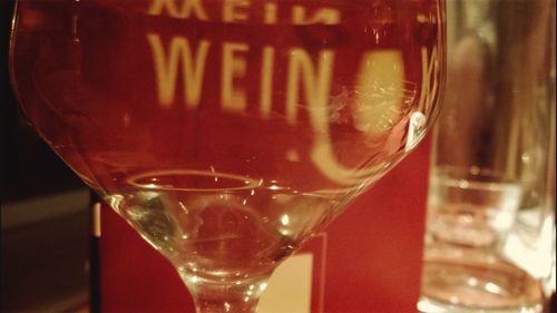 Close-up of beer glass on table