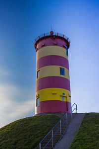 Low angle view of lighthouse against sky