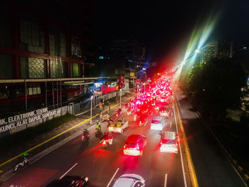 Traffic on city street at night