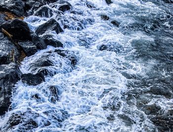 Full frame shot of rocks in sea