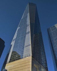 Low angle view of skyscrapers against sky