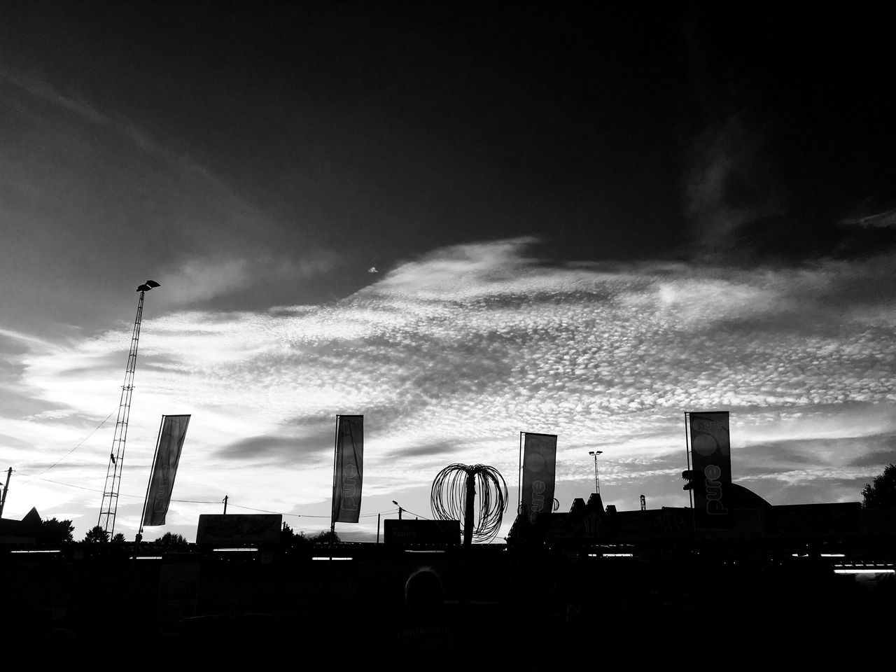 built structure, sky, architecture, cloud - sky, transportation, building exterior, silhouette, no people, low angle view, car, outdoors, city, day