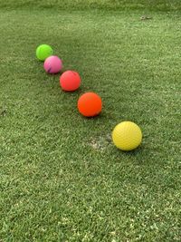 High angle view of multi colored ball on grass