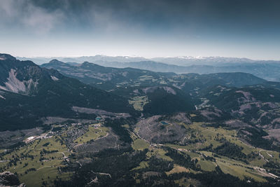 Aerial view of landscape and mountains against sky