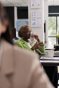 Business colleagues working in office