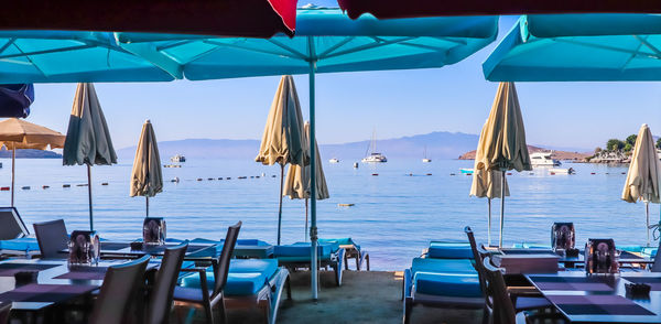 Boats in swimming pool at beach