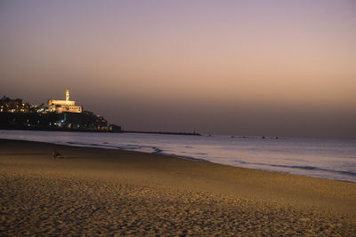 View of beach at sunset