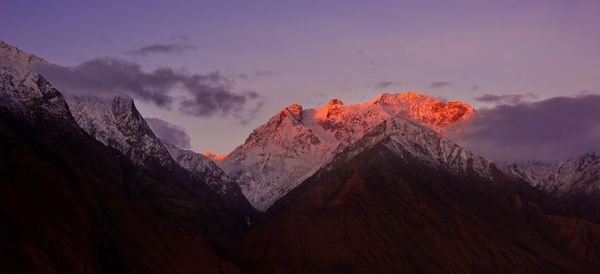 Scenic view of mountains against sky during sunset