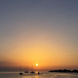Scenic view of sea at sunset