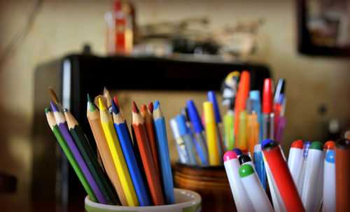 Close-up of colored pencils on table