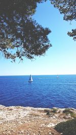 Scenic view of calm sea against clear sky