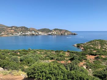 Scenic view of sea against clear blue sky