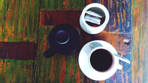 High angle view of coffee cup on table