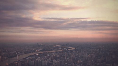 High angle view of townscape against sky during sunset