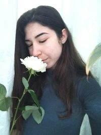 Young woman with flowers in hair