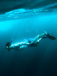 Man swimming in sea