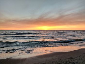 Scenic view of sea against sky during sunset