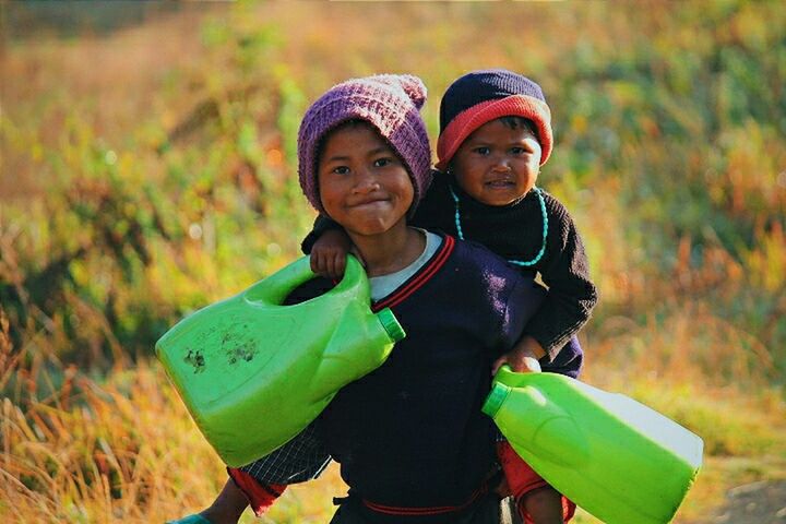 lifestyles, person, leisure activity, casual clothing, smiling, portrait, looking at camera, happiness, front view, childhood, boys, field, elementary age, focus on foreground, holding, cap, warm clothing