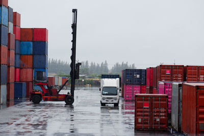 Stack of a commercial dock against clear sky