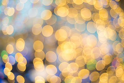 Defocused image of illuminated christmas lights