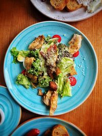 High angle view of vegetables in plate on table