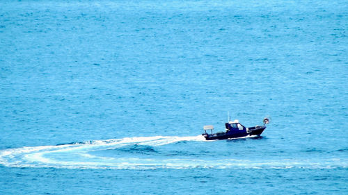 People on boat in sea