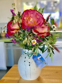 Close-up of vase on table at home