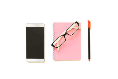 Directly above view of eyeglasses on white background