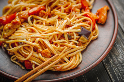 High angle view of pasta in plate on table