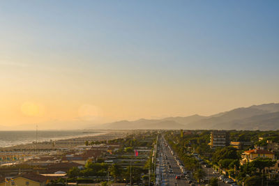 High angle view of townscape against sky during sunset