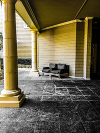 View of a dog sitting on floor in building