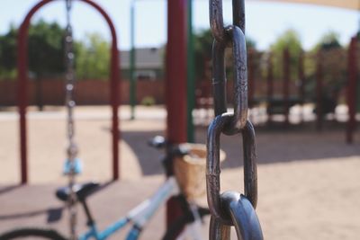 Close-up of swing in playground