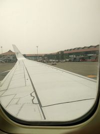 View of airport runway against clear sky