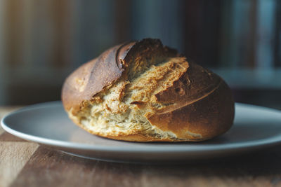 Close-up of bread in plate on table