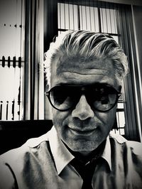 Close-up portrait of man wearing hat