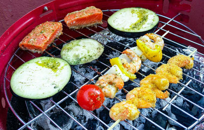 High angle view of food on barbecue grill