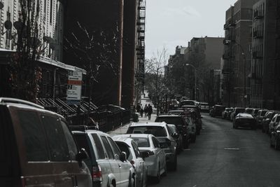 Cars parked in city