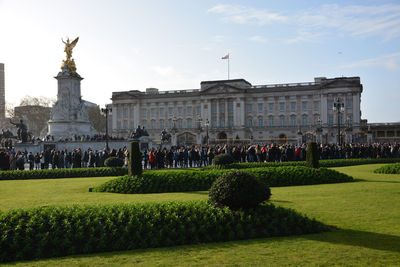 Group of people in front of historical building